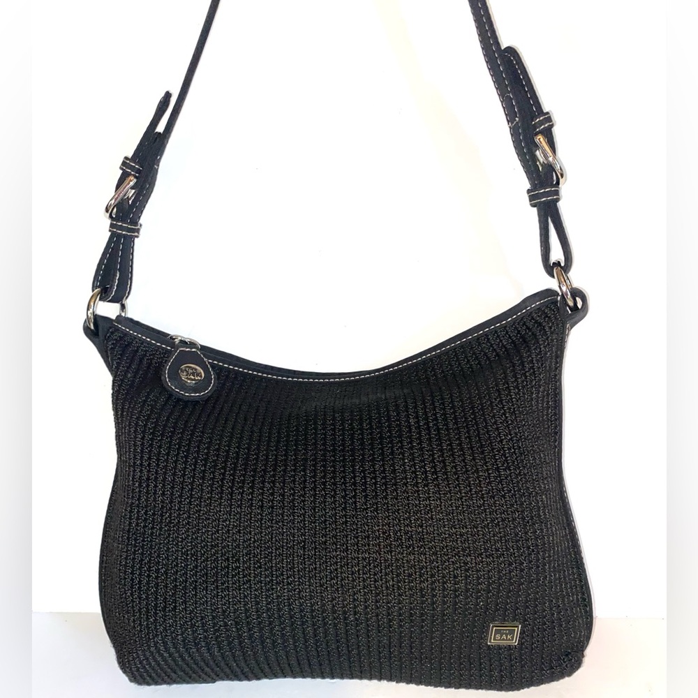 The Sak hobo shoulder bag purse in black weave. Woven colorful inside- like new